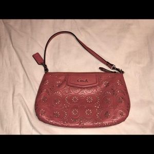Coach cutout pink wristlet bag